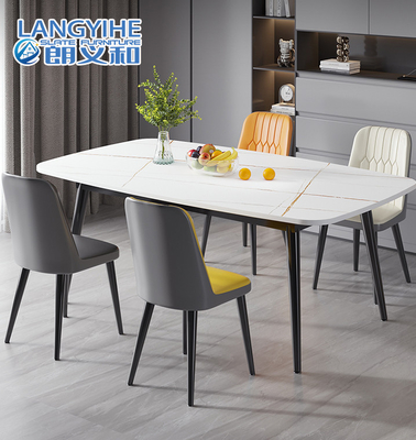 Forme ovale de marbre minimaliste de combinaison de table de salle à manger et de chaise en métal