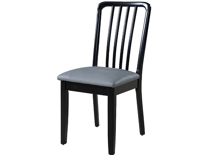 Noir en bois en caoutchouc de Brown d'éponge dinant des chaises tapissées