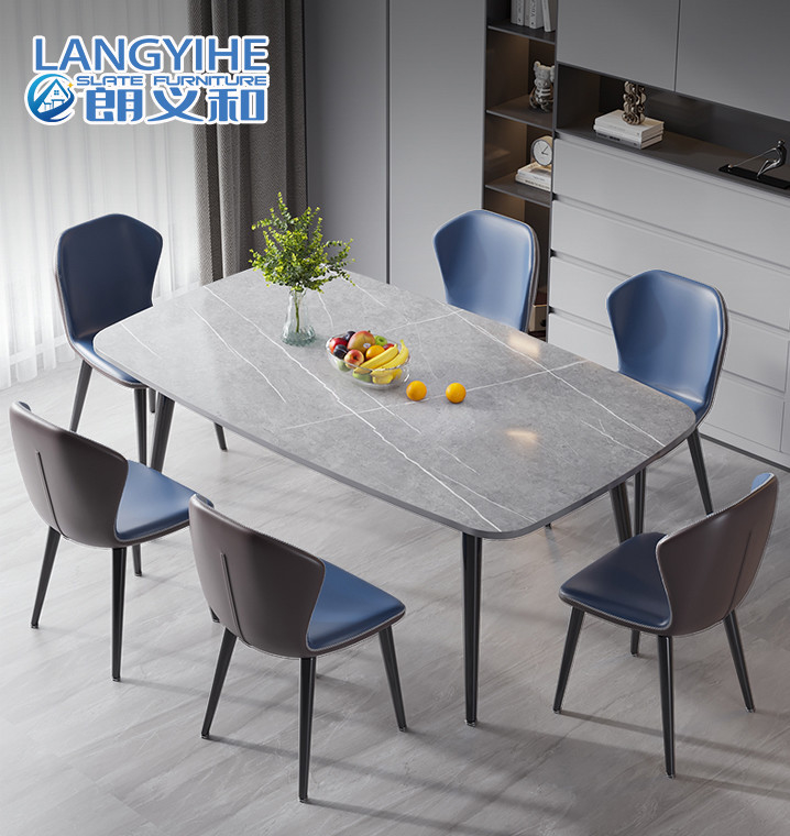 Forme ovale de marbre minimaliste de combinaison de table de salle à manger et de chaise en métal